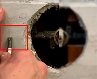 Remove the remaining caulk by flat screwdriver